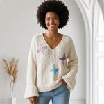 JERSEY, PULL, color crudo con aplicación de mariposas en lana enfieltrada