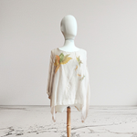 TUNICA ,blusa en gasa de seda, color beig dibujo de flores