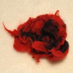 Broche en lana merino, afieltrado a mano