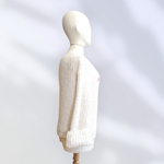 JERSEY, PULL, color crudo con aplicación de mariposas en lana enfieltrada