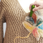 JERSEY, PULL, color beig, con aplicacion de flor en lana enfieltrada