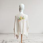 TUNICA ,blusa en gasa de seda, color beig dibujo de flores