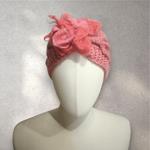 TURBANTE tipo cinta trenzada de color coral con flor coral de lana fieltro