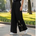 Pantalón, color negro, dibujo de espigas, en viscosa saten
