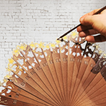 ABANICO baraja con calado,  color madera, dibujo de flor en oro, madera de arce lacado, tamaño medio