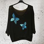 CAMISETA, PULL, calado color negro con aplicación bordada de mariposas en lanaenfieltrada