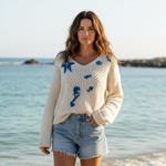JERSEY, PULL, color crudo con aplicación de pececitos en lana enfieltrada