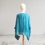 TUNICA ,blusa en gasa de seda, color azul con dibujo de mariposas