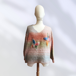 JERSEY, PULL, con hilo de fantasía multicolor con aplicacion de mariposas en lana enfientrada 