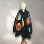 Chaquetón reversible color petroleo con bordado de patch multicolor