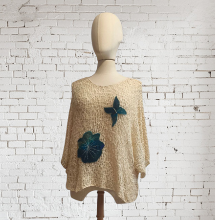 Pull calado con aplicaciones en lana enfieltrada: moda artesanal única | Artesania Textil