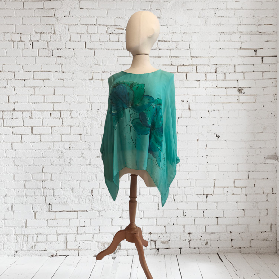 TUNICA ,blusa en gasa de seda, color azul turquesa, dibujo de flores 
